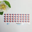 Load image into Gallery viewer, Adhesive resin for clays MF-82 American flag Heart ( 1.5 cm) 40 units